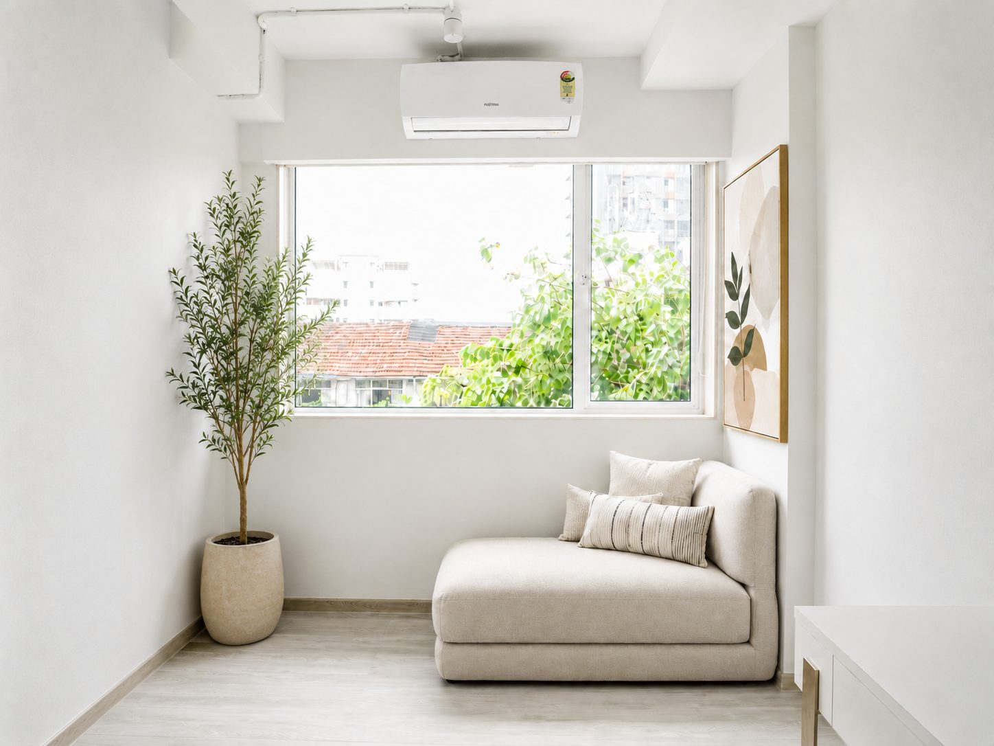The window lounge with a chaise and city view