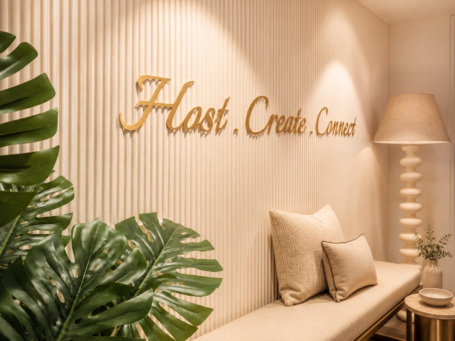 The fluted wall with Host, Create, Connect lettering